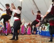 People at Greek Festival dancing