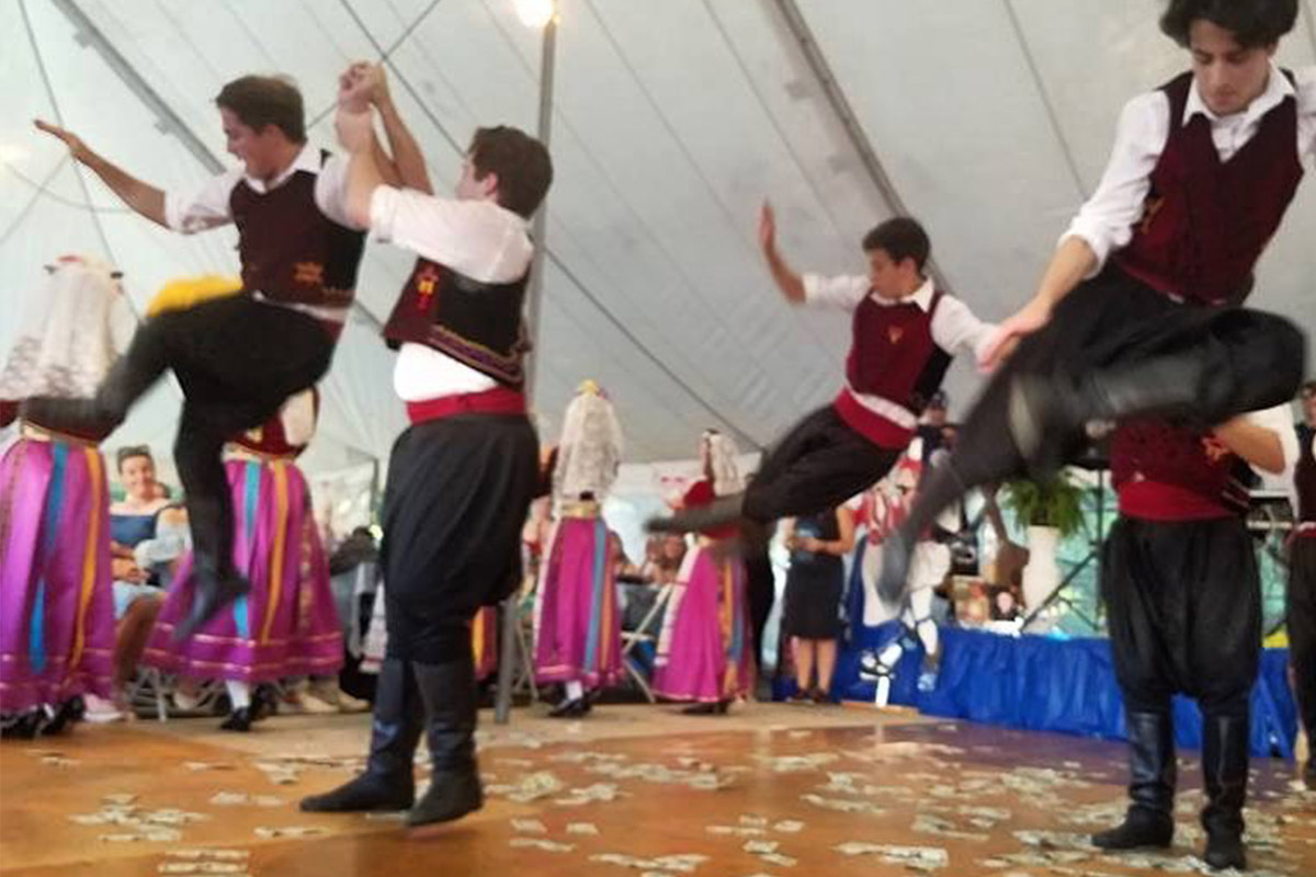 People at Greek Festival dancing