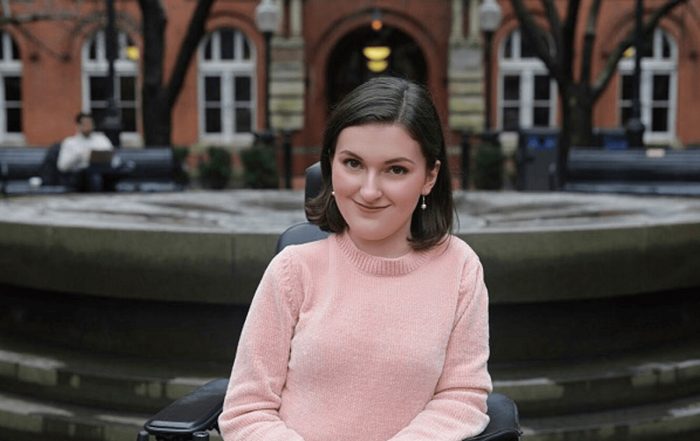 Anna Landre in pink sweater