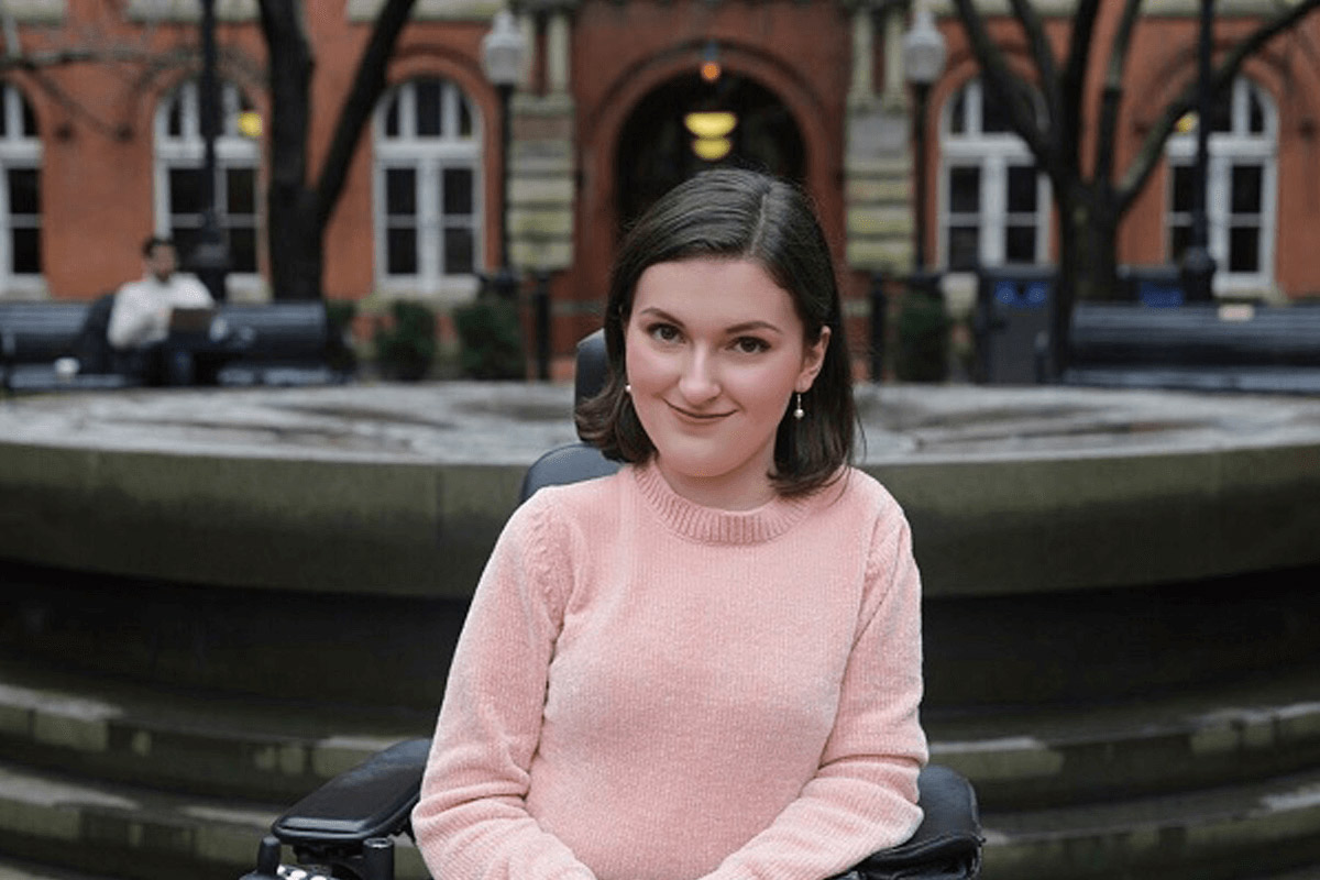 Anna Landre in pink sweater