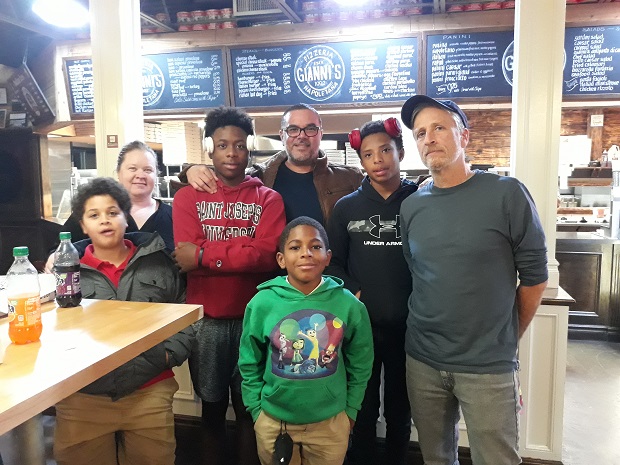 Jon Stewart with members of Male Mentorship Program