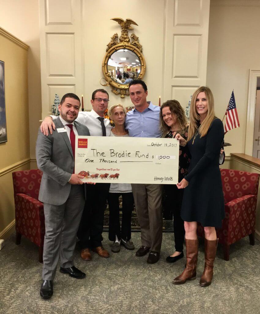 The Rumson Branch of Wells Fargo present a check to The Brodie Fund