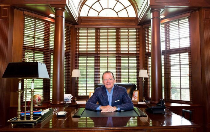 Portrait of Jack Howley sitting at desk