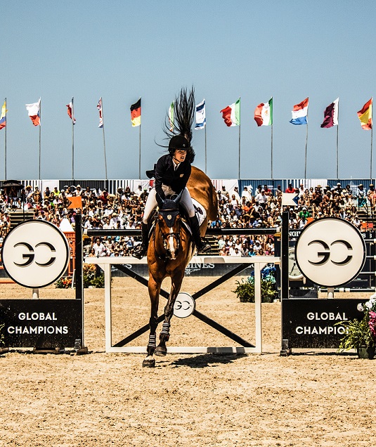 Jessica Springsteen riding a horse; Global Champion