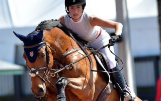 Jessica Springsteen riding a horse