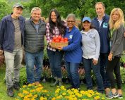 Jon Stewart with wife, family, volunteers for Farm Foundation