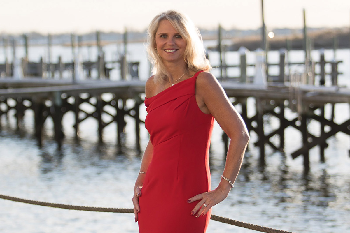 Nancy Zarriello in a red dress