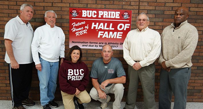 Coaches and former coaches in front of RBR Hall of Fame