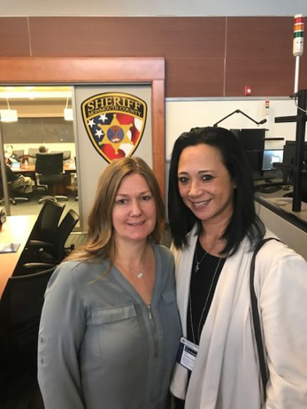 Donna Ongsiako and woman at the sheriff's department