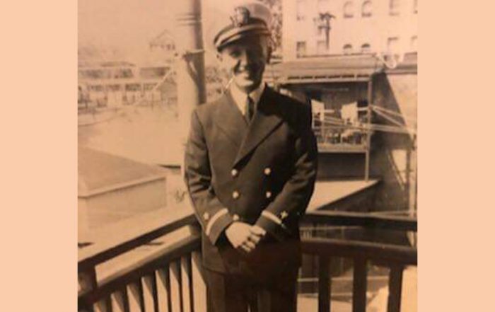 WWII Vet posing in uniform, vintage photo, black and white