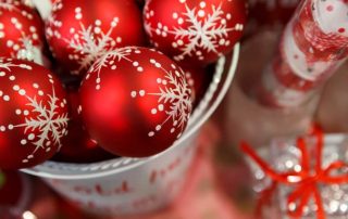 Basket full of red Christmas ornaments