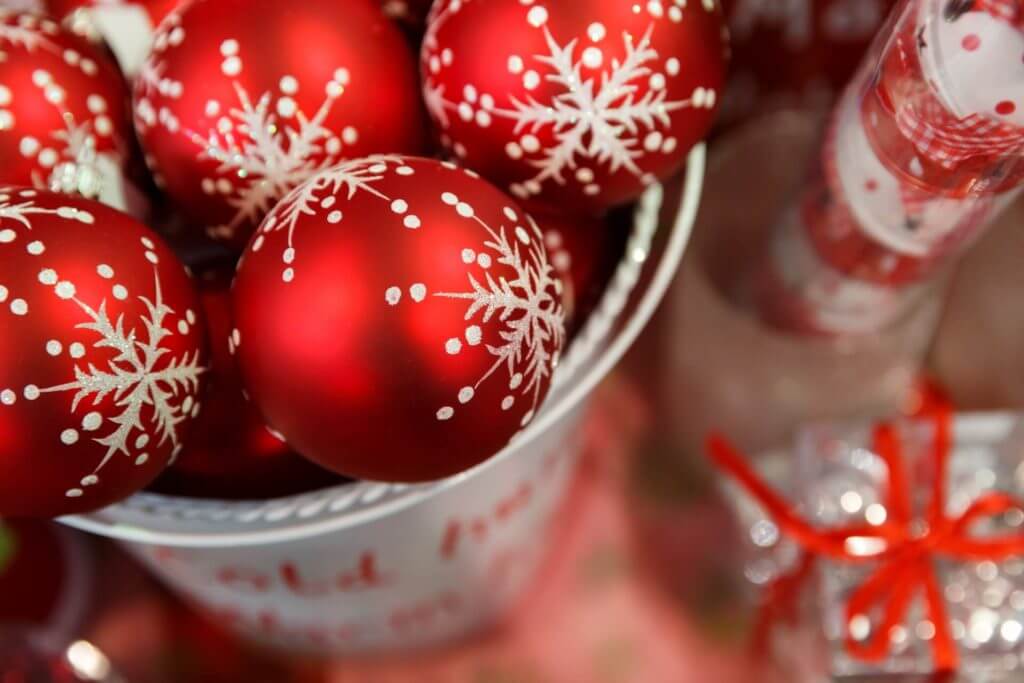 Basket full of red Christmas ornaments