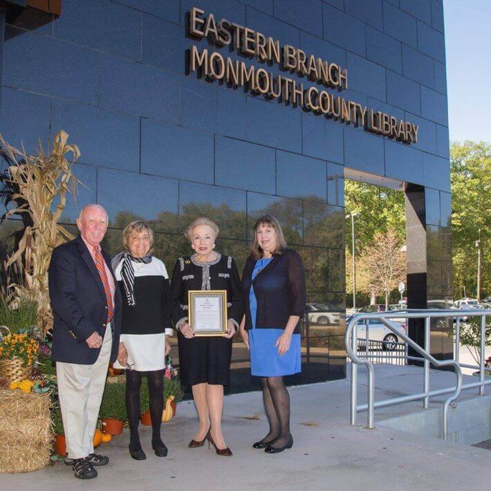 Lillian Burry being presented a Certificate of Honor from the The Monmouth County Library Commission