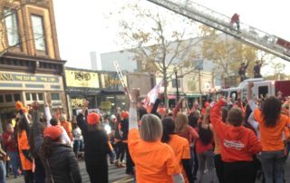 Crowd in Red Bank dancing for kindness