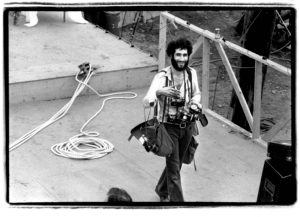 Person on stage at Woodstock; B & W photo