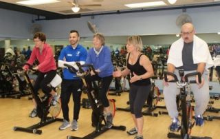 Group of people pedaling at YMCA