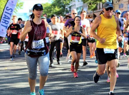 Group of people running in Red Bank Classic