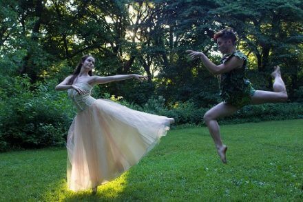 Ballet dancers dancing in the woods