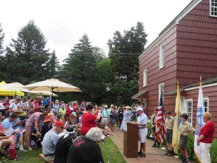 Crowd outside of Allen House celebrating July 4th