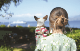 Woman holding her dog